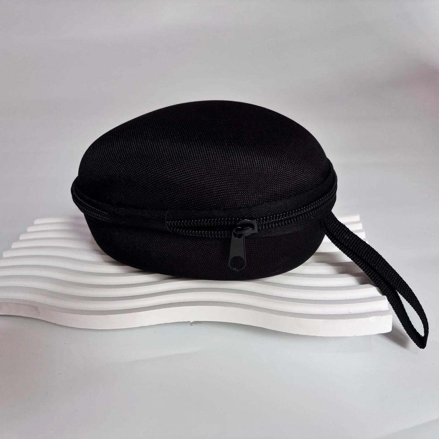 Sacoche de protection portable en EVA pour moulinet de pêche.
